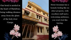 a flyer for a hotel with pink flowers on it at Hotel Aryaman in Haridwār