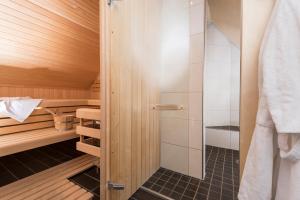 Postel nebo postele na pokoji v ubytování Hotel Tiek Superior