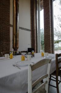 ห้องอาหารหรือที่รับประทานอาหารของ Il Riposo
