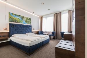 Postel nebo postele na pokoji v ubytování Hotel Eitljörg + 37 fotografií