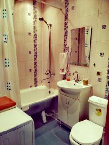 
Ванная комната в Апартаменты NG на Торосова
