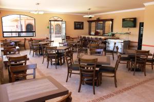 מסעדה או מקום אחר לאכול בו ב-Hotel Villa Bernal