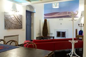 A seating area at Villa Tipica Casa Tua