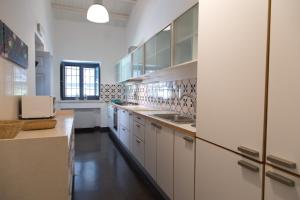 A kitchen or kitchenette at Villa Tipica Casa Tua