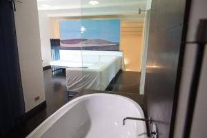 A bed or beds in a room at Villa Tipica Casa Tua