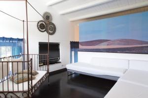 A bed or beds in a room at Villa Tipica Casa Tua