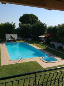 The swimming pool at or close to Dimeon Villa