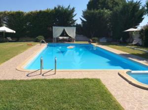 The swimming pool at or close to Dimeon Villa