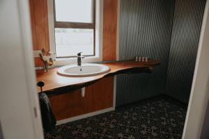 a bathroom with a sink and a window at Kay Bell in Masterton +9 photos