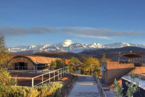 a view of a mountain range with snow covered mountains at The Ranch Camp in El Karia +60 photos