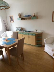 A kitchen or kitchenette at Appartements-Ella