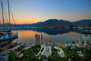 a view of a body of water with boats in it at Losta Sahil Evi 2 in Selimiye