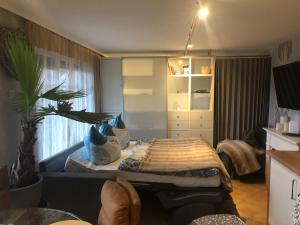a bedroom with a bed in a room at Ferienwohnung Am Eichenberg in Blankenburg