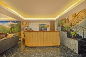 a lobby of a hotel with a reception counter at Royal Hotel Gangtok in Gangtok