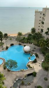 an overhead view of a swimming pool at a resort at 2BR Seaview Condo with Balcony at Riviera Bay Resort, Melaka in Malacca +3 photos