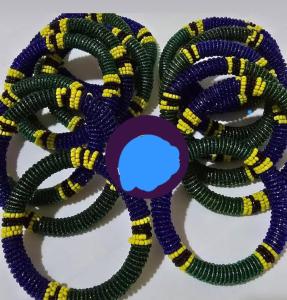 a purple and yellow rope with a blue dot at Mabegi african Designs in Arusha +45 photos