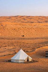 a tent in the middle of the desert at Stars Dunes Private Camp in Badīyah