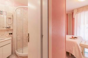 a bathroom with a shower and a sink at Hotel Matilde in Marina di Massa +65 photos