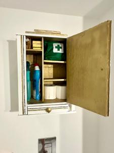 an open cabinet in a room withiazepamiazepines at La Pastourelle en Lozère in Le Bacon