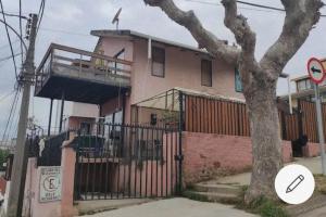 a house with a balcony on the side of it at KositasRikas B&B in Viña del Mar
