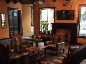 Фоайе или бар в Hostal La Chorrera