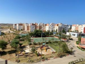 an aerial view of a park with a playground at Super Logement in Tangier