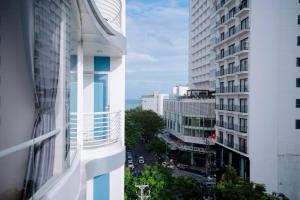 a view of a city street from a building at Violet hotel&spa in Nha Trang