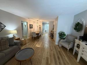 a living room with a couch and a table at Branson Ridge Retreat in Branson