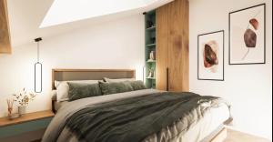 a bedroom with a bed and a white wall at WBR Apartlak in Villány