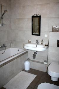 Kúpeľňa v ubytovaní Apartament Kolberga w Sopocie