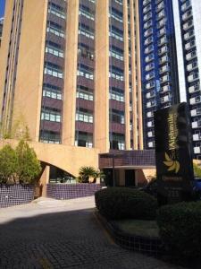 a large building with tall buildings in the background at StudioTriplo Superior Completo 608- Casal e Solteiro ou 3 Solteiros in Barueri