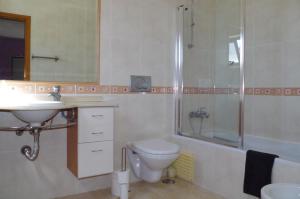 Et badeværelse på BellaVita City Faro