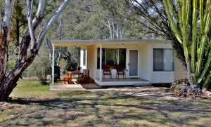 
A porch or other outdoor area at Capertee National Park Cottages
