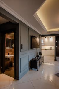 a kitchen with a stove and a sink in a room at Czantoria View Apartment Ustroń in Ustroń