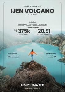 a poster for a movie with a person standing on top of a mountain at Zzz Malang Hostel in Malang