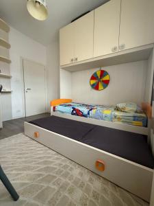a bedroom with a large bed in a room at Appartamento Venezia in Marghera