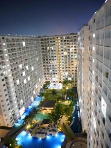an aerial view of a large building with a pool at 953 D shore 1 in Manila