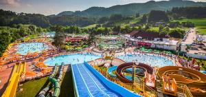 an aerial view of a large water park at KOZJANSKA KOČA in Podčetrtek