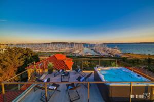a swimming pool on the deck of a cruise ship at Apartments KIDS in Kaštela
