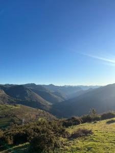 a view of a valley with mountains in the distance at Cal Mengo in La Vega +3 photos