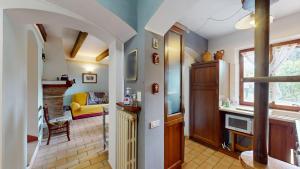 a hallway of a home with a living room at house Al Cascinale in San Severino Marche