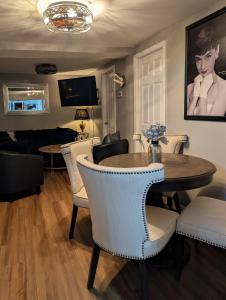 a dining room with a table and chairs at The Hillside Hottie! in Corydon