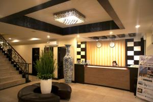 The lobby or reception area at Sky View Hotel Managed by OS