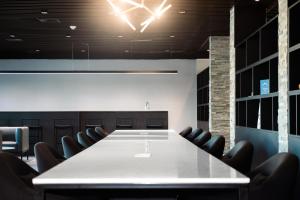 a conference room with a white table and chairs at Hotel Tano Guam in Tumon +47 photos