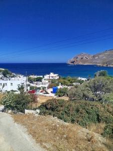 a view of a town and the ocean at Margarita's home in Nísos Skýros