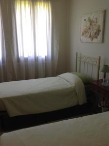 Postel nebo postele na pokoji v ubytování Le Tre Querce B&B