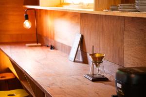 a table with a hourglass on it in a kitchen at White Bird in Hokuto +39 photos