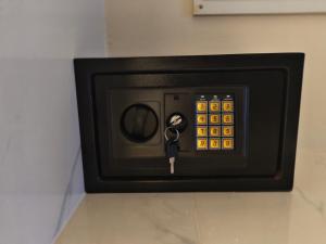 a black microwave with a key in it at Koh tao two view in Ko Tao