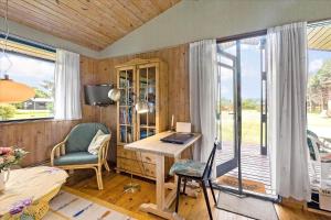 a home office with a desk and a window at 1055-Stege-Rylevej-21 in Stege