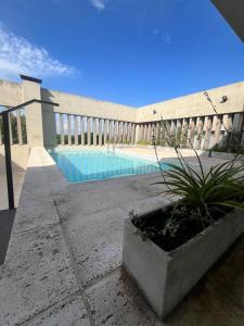 a house with a swimming pool in a yard at Aires Almafuerte in Saladillo